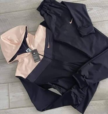 Gornji i donji deo: Nike ženska trenerka za punije dame Nobvo Mokra likra Veličine 2xl — 4