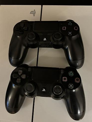 pse 4: Sony PlayStation 4 (PS4) – White versiya Xüsusiyyətlər: - Rəng: ağ — 2