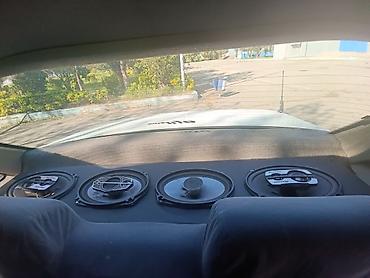 Daewoo: Daewoo Nexia sedan, 4 qapı, ağ rəng. - Kuzov: kompakt sedan, ön — 5