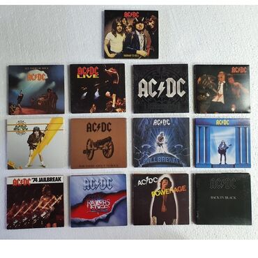 fly ezzy: AC/DC (dünyaca məşhur rock qrupu) disk şəklində albomları satılır