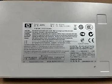 Modemi, ruteri i mrežni uređaji: HP ProCurve Switch 408 (model J4097C) - Mrežni preklopnik sa 8 Fast — 9