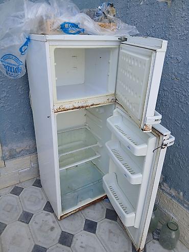 islenmis soyducu: Bir kameralı məişət soyuducusu, yuxarıda ayrıca dondurucu bölməsi ilə — 1