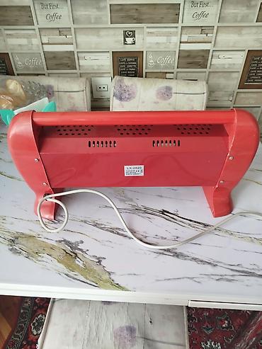 not 12s: Elektrikli qızdırıcı – model LX-2820 - Rəng: qırmızı - Güc: 1300 W — 2