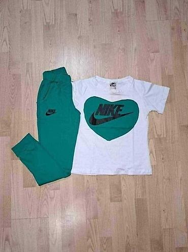 nike suknja: Ženski sportski komplet majica i donji deo trenerke sa dzepovima. Bela — 4
