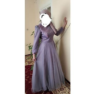 Qadın geyimləri: - Rəng: Pastel bənövşəyi (lilac). - Ölçü: L (40). Qeyd: Tül — 2