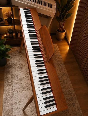 Elektro Pianino Qəhvəyi rəngli 88 klaviş tam oktava Pianino səslidir 4 lalafo.az -da Elektro Pianino Qəhvəyi rəngli 88 klaviş tam oktava Pianino səslidir 4
