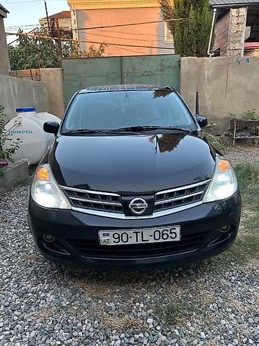 Транспорт: Nissan Tiida: 1.5 л | 2011 г. Хэтчбэк — 5