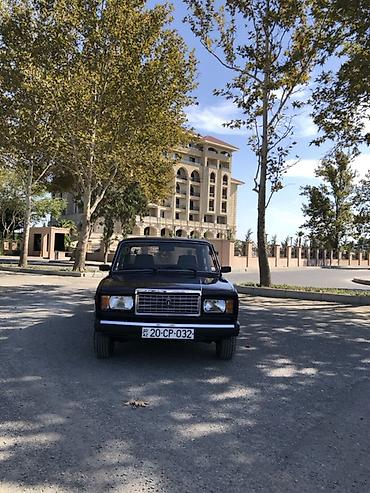 avto karavan: LADA Riva/2107 sedan - Kuzov: 4 qapılı sedan, qara rəng. Xrom ön — 3
