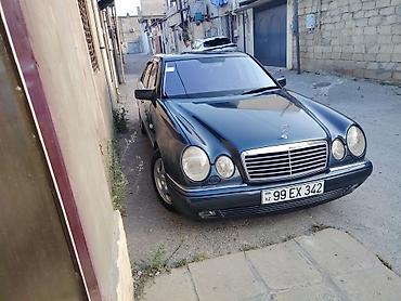 w210 duman: Mercedes-Benz E-Class: 2.4 l | 1998 il Sedan — 4