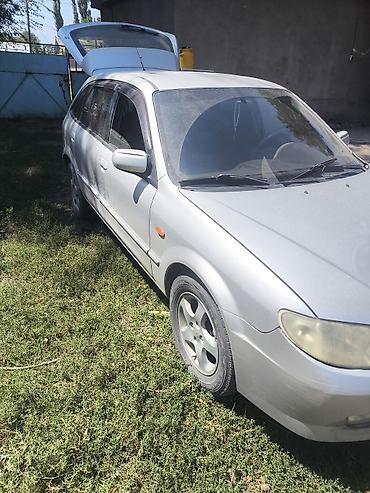 мотор нексия 1: Mazda 323: 2001 г., Механика, Универсал — 5