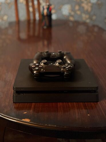 ps4 işlənmiş: PS4 1Tlb içinde 6+ tannmş oyun(Mortal kombat,fifa,gta,rdr) və s