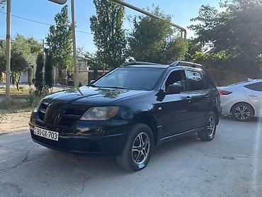 mitsubishi pikap: Mitsubishi Outlander, qara rəng, 5 qapılı krossover/SUV — 8