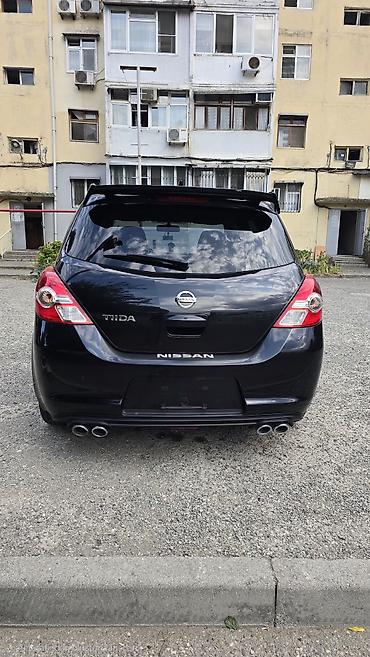 sport sukan: Nissan Tiida: 1.5 l | 2011 il Hetçbek — 2