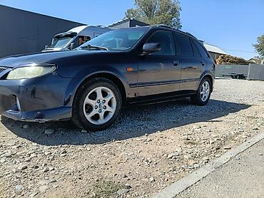 бишкек авто салон: Mazda 323: 2002 г., 2 л, Автомат, Бензин, Хетчбек — 1