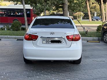 bmw e 38: Hyundai Elantra: 2 l | 2009 il Sedan — 9