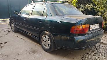 бартовой машина: Mitsubishi Carisma: 1997 г., Автомат, Бензин — 2