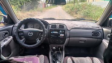 mazda cx: Mazda 323: 2003 г., 1.6 л, Механика, Бензин, Хэтчбэк — 4