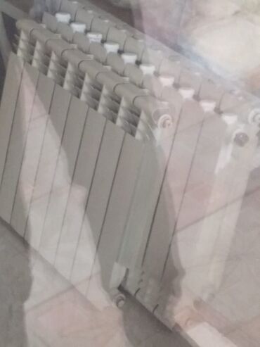 ev qaplari: Alüminium seksiyalı radiator - Material: yüksək istilikkeçirməli