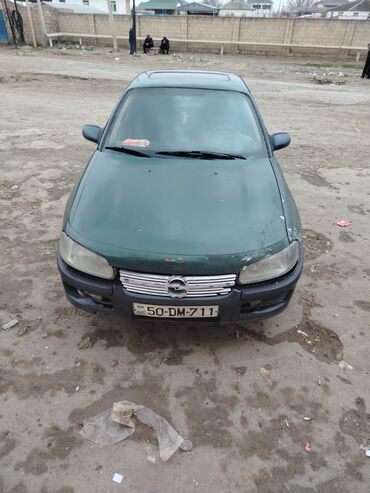 maş: Opel Omega: 2 l | 1996 il 2300 km Sedan