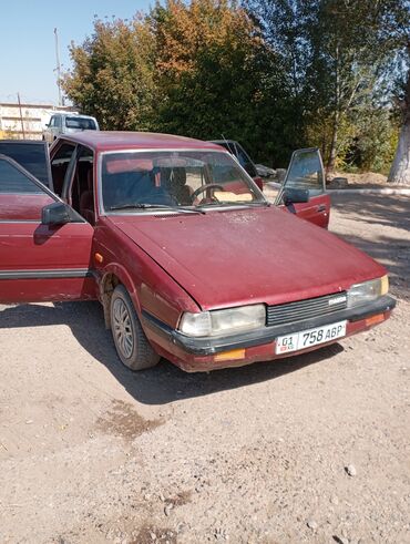 Mazda: Mazda 626: 1984 г., 0.2 л, Механика, Бензин, Седан