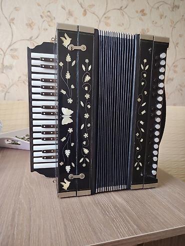 Qarmon, Akustik, İşlənmiş, Ünvandan götürmə