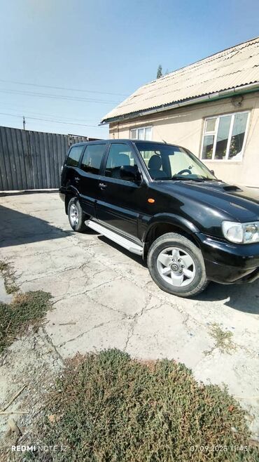 срочно продаю в связи с переездом: Nissan Terrano II, черный, 5‑дверный внедорожник. Кузов и экстерьер