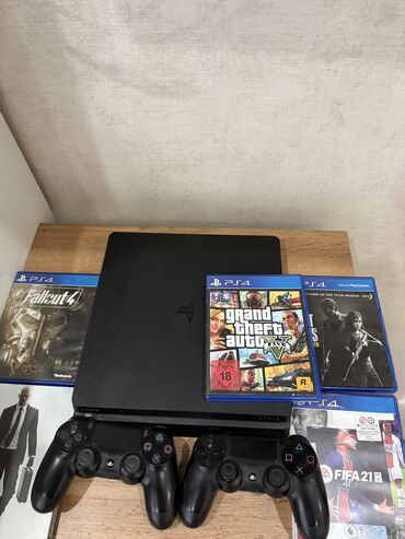 PS4 (Sony Playstation 4): PlayStation 4 Slim ideal vezyetde Qiymete daxildir 2 Dualschok
