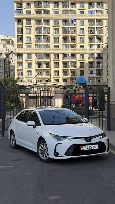 Toyota Corolla: 2022 г., 1.8 л, Вариатор, Гибрид, Седан at lalafo.kg Toyota Corolla: 2022 г., 1.8 л, Вариатор, Гибрид, Седан