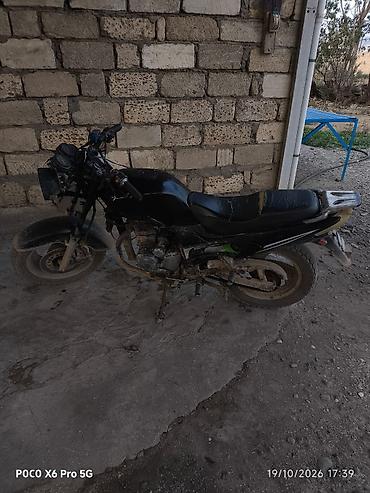 matasklet kredit: Motosiklet – çılpaq/naked üslubda, qara rəngli gövdə Texniki — 1