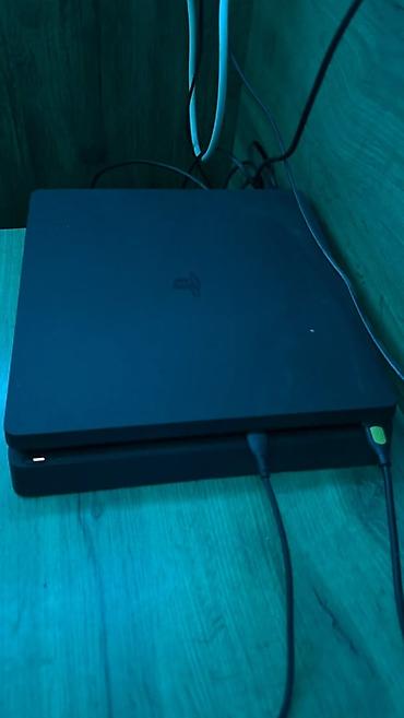 sony xm6: PlayStation 4 Slim (чёрная) - Компактная версия консоли с матовым — 4