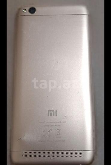 redmi 3 s: Xiaomi 16 GB, rəng - Qızılı, 
 İki sim kartlı — 2