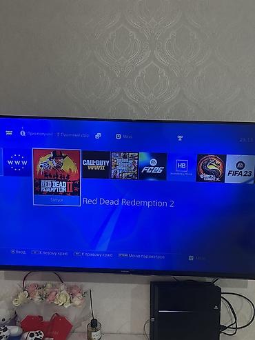 PS4 (Sony Playstation 4): Sony playstation 4 1TB Konsol evde isledilib. Yaxsi baxilib. Ideal — 5