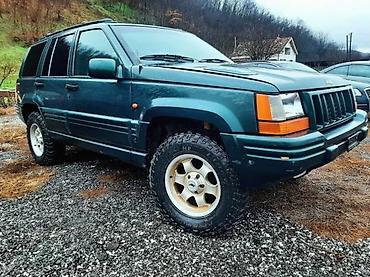 suv vozila: JEEP GRAND CEEROKE 5.9 2KOM STRANCI | Proverite istoriju vozila Da — 2