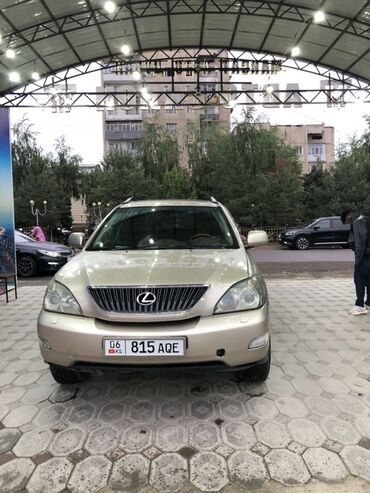 lexus lx 370: Автомобиль Lexus RX 350 золотистого цвета. Этот кроссовер отличается