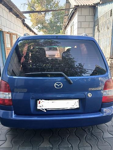 туманик одиссей: Mazda Demio: 2000 г., 1.5 л, Механика, Бензин, Хэтчбэк — 9