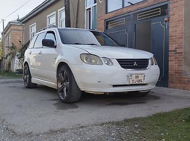 qosqular satisi: Mitsubishi Airtrek: 2 l | 2002 il 360000 km Universal — 1