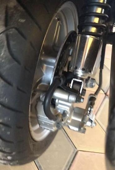 Suzuki: Suzuki Skywave 650 (Burgman) – крупный туристический максискутер — 8