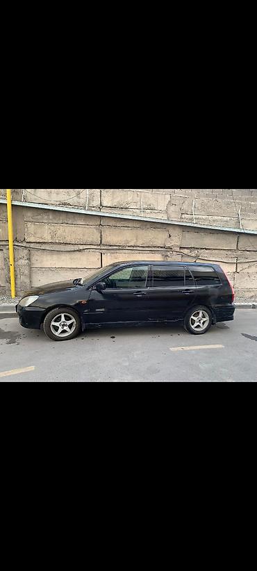 Mitsubishi: Mitsubishi Lancer: 2001 г., 1.8 л, Автомат, Бензин, Универсал — 12