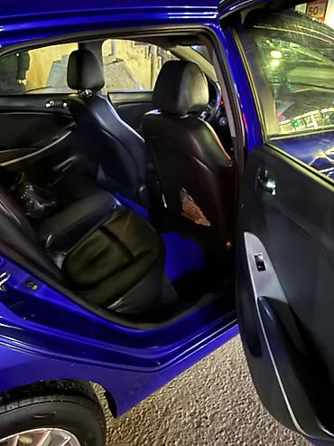 Hyundai: Hyundai Accent (hatchback) – mavi rəng - Kuzov: 5 qapılı hatchback - — 9