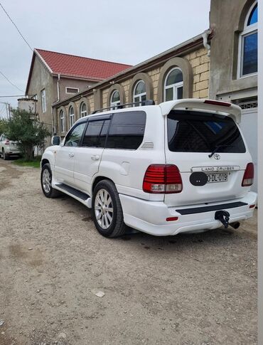 Toyota: Toyota Land Cruiser 2002 – baxımlı, əziyyət görməyib. Ağ rəngdədir — 19