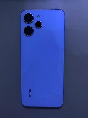 xbox console: Смартфон Redmi 12, цвет голубой. Основные характеристики: - Память: 4 — 1