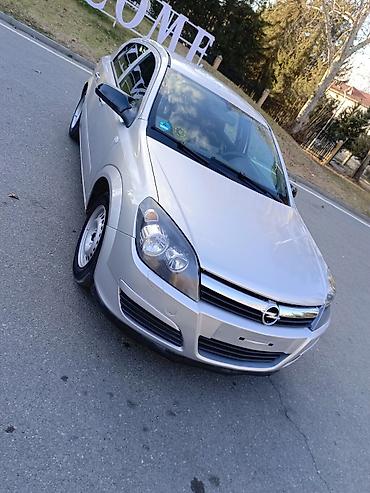 Opel: Opel Astra H – gümüşü rəng, 5 qapılı hetçbek.Hazır maşındı.ikinci — 9