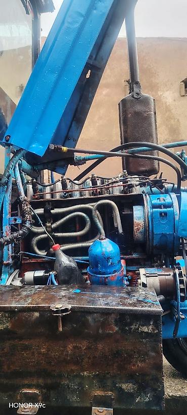 Kommersiya nəqliyyat vasitələri: Kənd təsərrüfatı üçün universal təkərli traktor Xüsusiyyətlər: - — 9