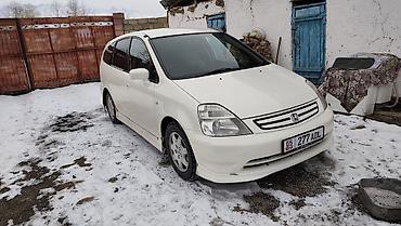 отделка салона авто: Honda Stream: 2003 г., 1.7 л, Минивэн — 2