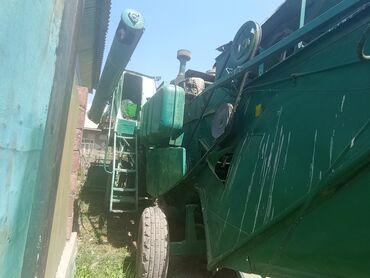 прием бу аккумуляторов цена бишкек: Зерноуборочный комбайн, окрашенный в зеленый цвет с желтыми акцентами