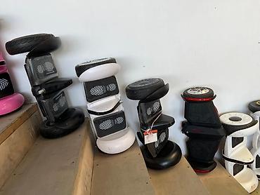 Elektrikli samokatlar: Tutacaqlı segwayHoverboard — iki təkərli, elektriklə işləyən bir növ — 2