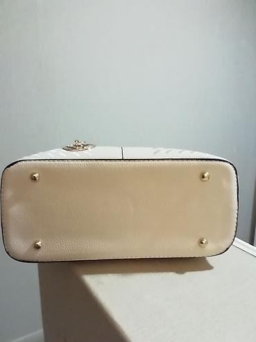 caprice koferi: Nova prelepa bež tašna dužine 30cm i visine 22cm. 3 pregrade unutra — 7