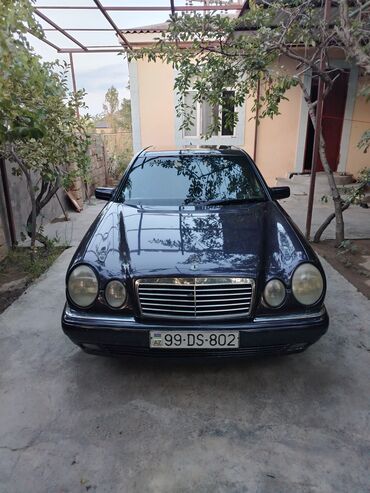 5 ulduz disk: Mercedes-Benz E 220: 2.2 l | 1997 il Sedan