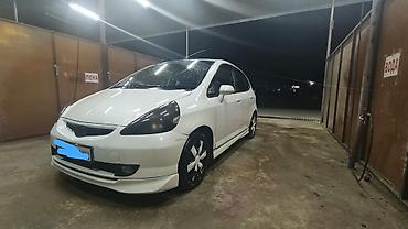 чехлы бу: Honda Fit: 2002 г., 1.3 л, Вариатор, Бензин, Хэтчбэк — 4