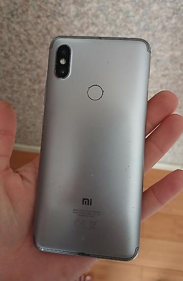 telefon mikrofonu: Xiaomi Mi A2, 32 GB, rəng - Gümüşü, 
 Sensor — 2